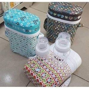 Patterned Bottle-Carrier Arrangement with Pale Bottles