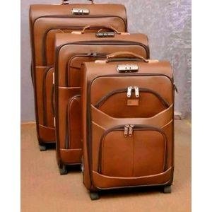 Pure 3 in 1 suitcases It's Brown in colour very strong and its water proof material it has strong zipper Lock it has 2 Wheeler spinner