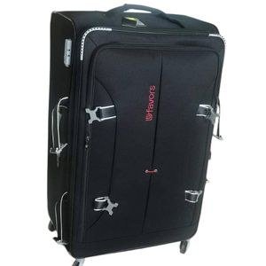 A Vintage Big Size Suitcase Size 32,It Carrie's 28-45Kgs, It's Strong Pure Cloth It's 4-Wheels It Has Good Material -Black