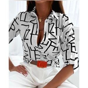 White Button-Up Blouse with Dark Geometric Pattern