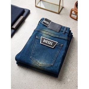 Men's Denim Jeans – Classic Slim-Fit Medium Blue Wash Pants with Embossed Logo Patch.
